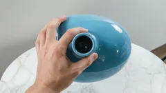 Fles of vaas met een smalle hals schoonmaken zonder borstel: oma's truc